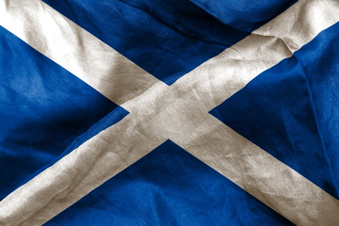 Scottish flag texture creased and crumpled up