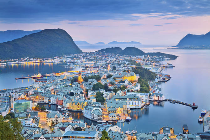 Image of norwegian city of Alesund during twilight blue hour.