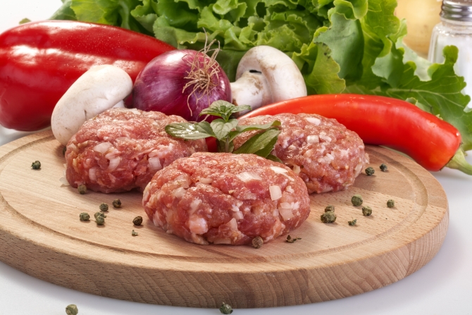 burgers with fresh vegetables herbs and salad