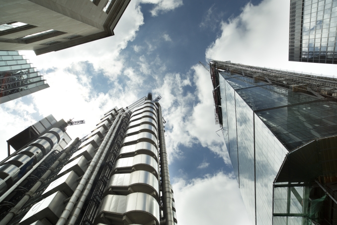 fisheye shot of london's financial centre focusing on lloyds of london building