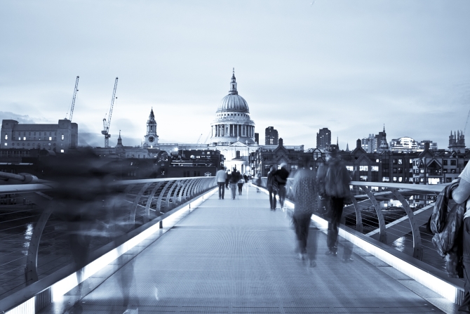Blurred people on the Millennium bridge, London.