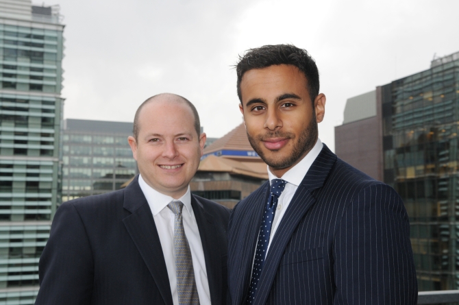 Adam Ramshaw (left) welcomes Ankur Chadha to the capital markets team